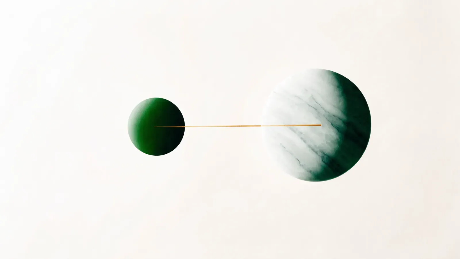 A small green disc and a large stone disc connected by a taut amber line